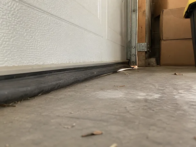 Garage threshold and stored boxes in a Palmdale-style home during cool-season daylight