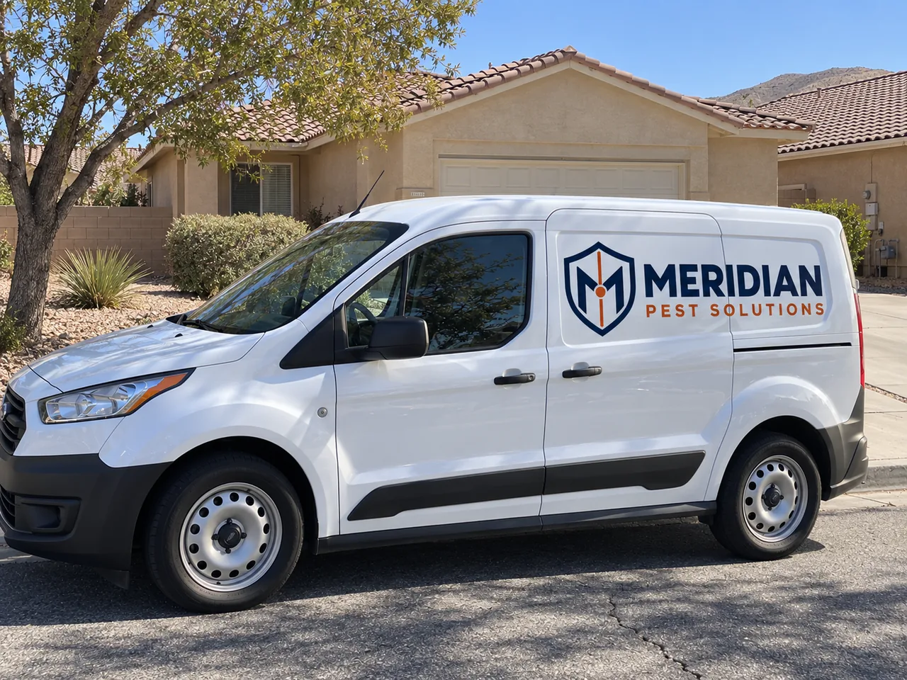 White Meridian Pest Solutions van parked outside a Palmdale-style stucco home